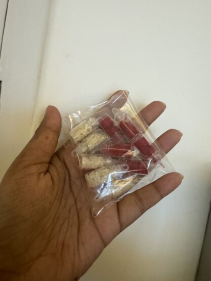 Filled roli chawal bottles